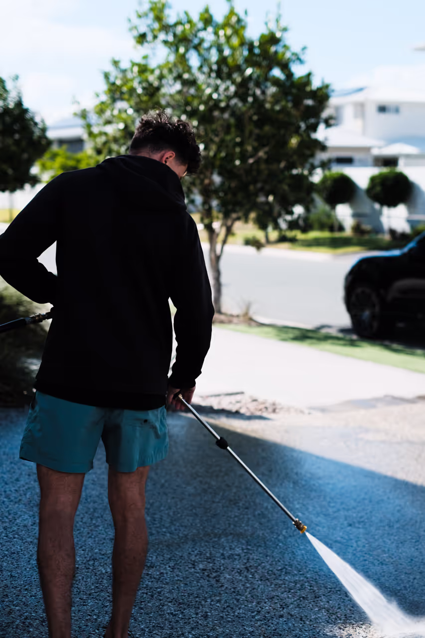 A man cleaning the street 