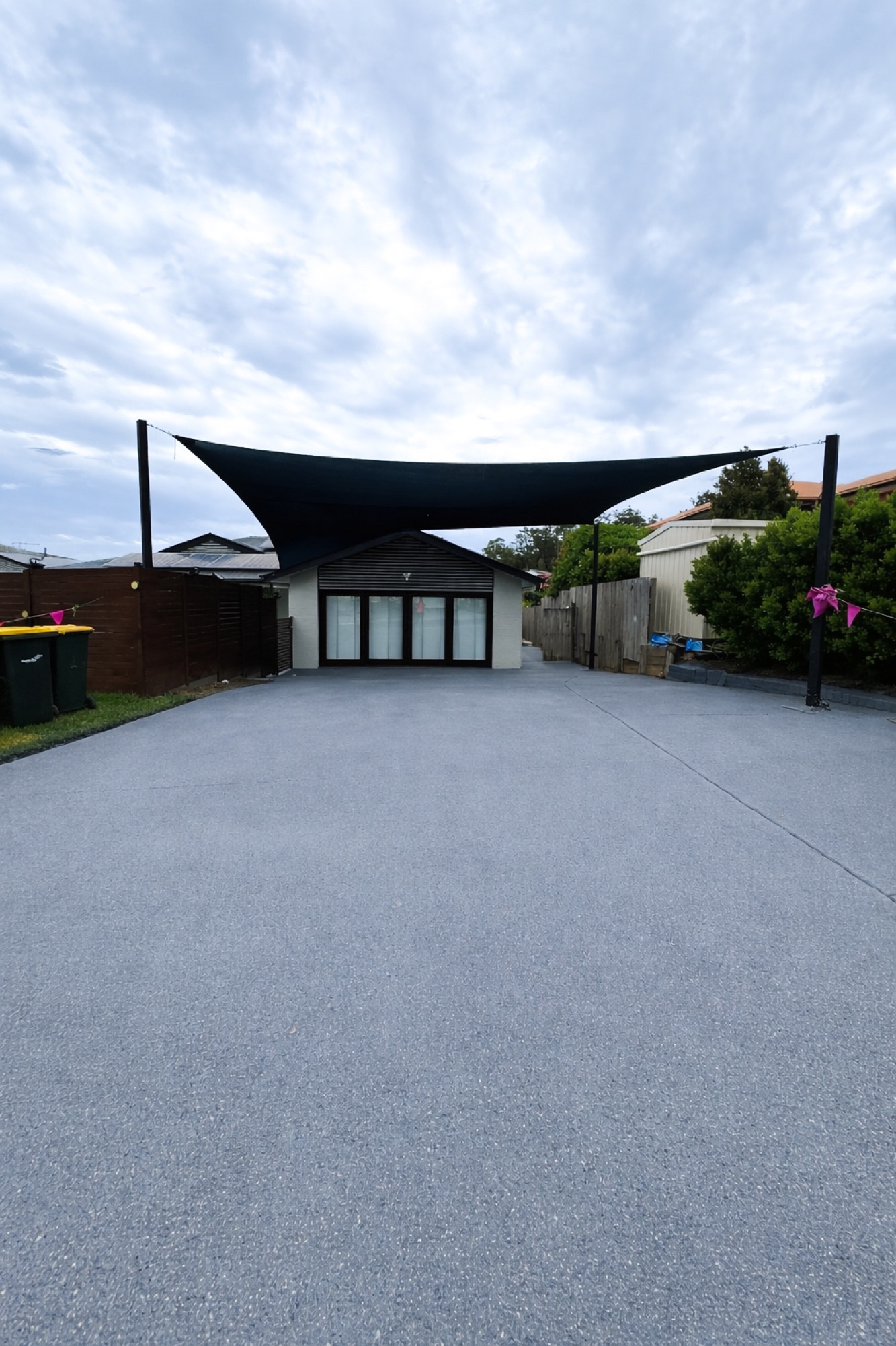 Driveway after covercrete resurfacing - Atlantic colour with black and white fleck finish